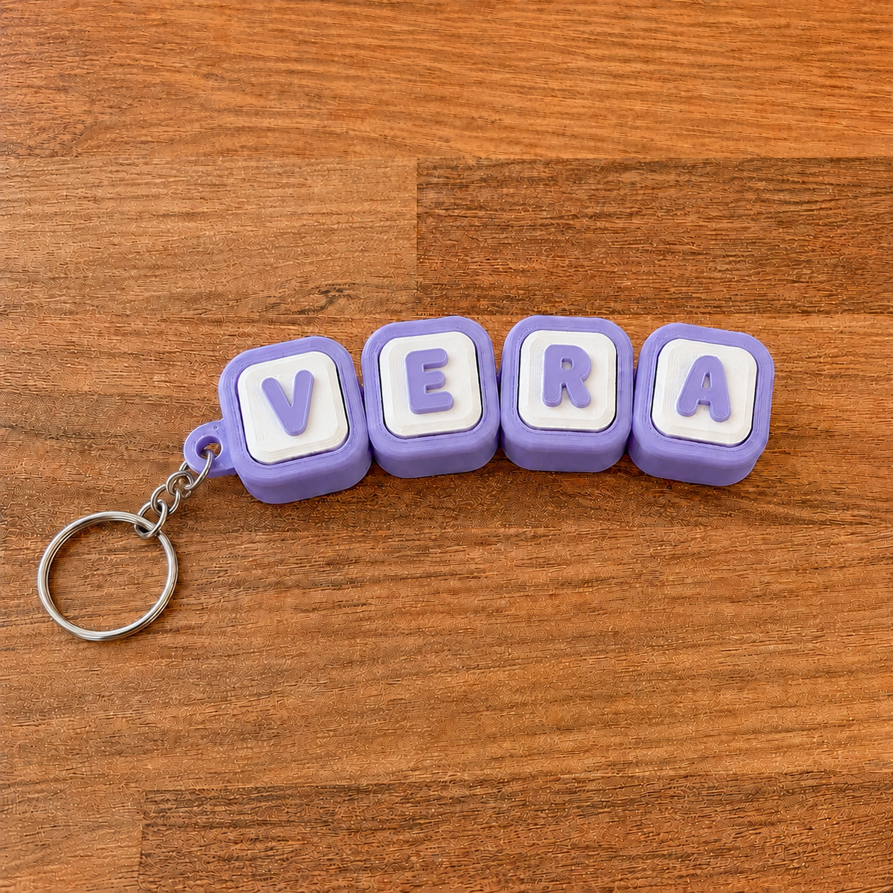 Personalized name tag clicker keyring 'Vera' — purple steel keyring, 3D printed