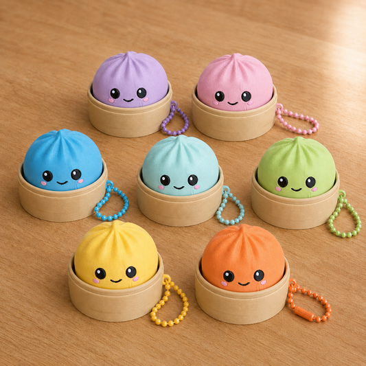 Seven dumpling fidget clicker keychains in bamboo steamer baskets, in purple, pink, blue, teal, green, yellow and orange