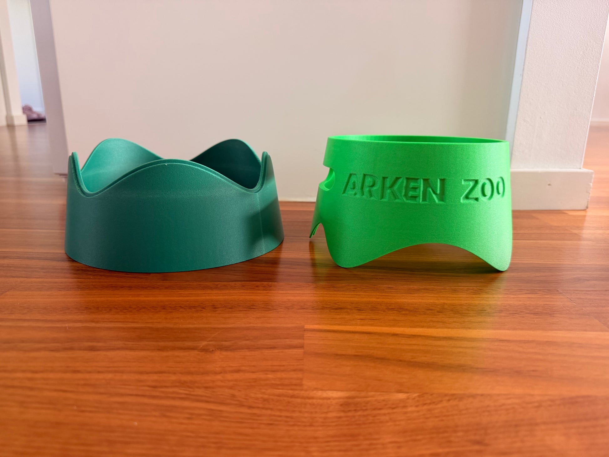 The two halves separated, showing the wavy joint that lets you mix and match colours
