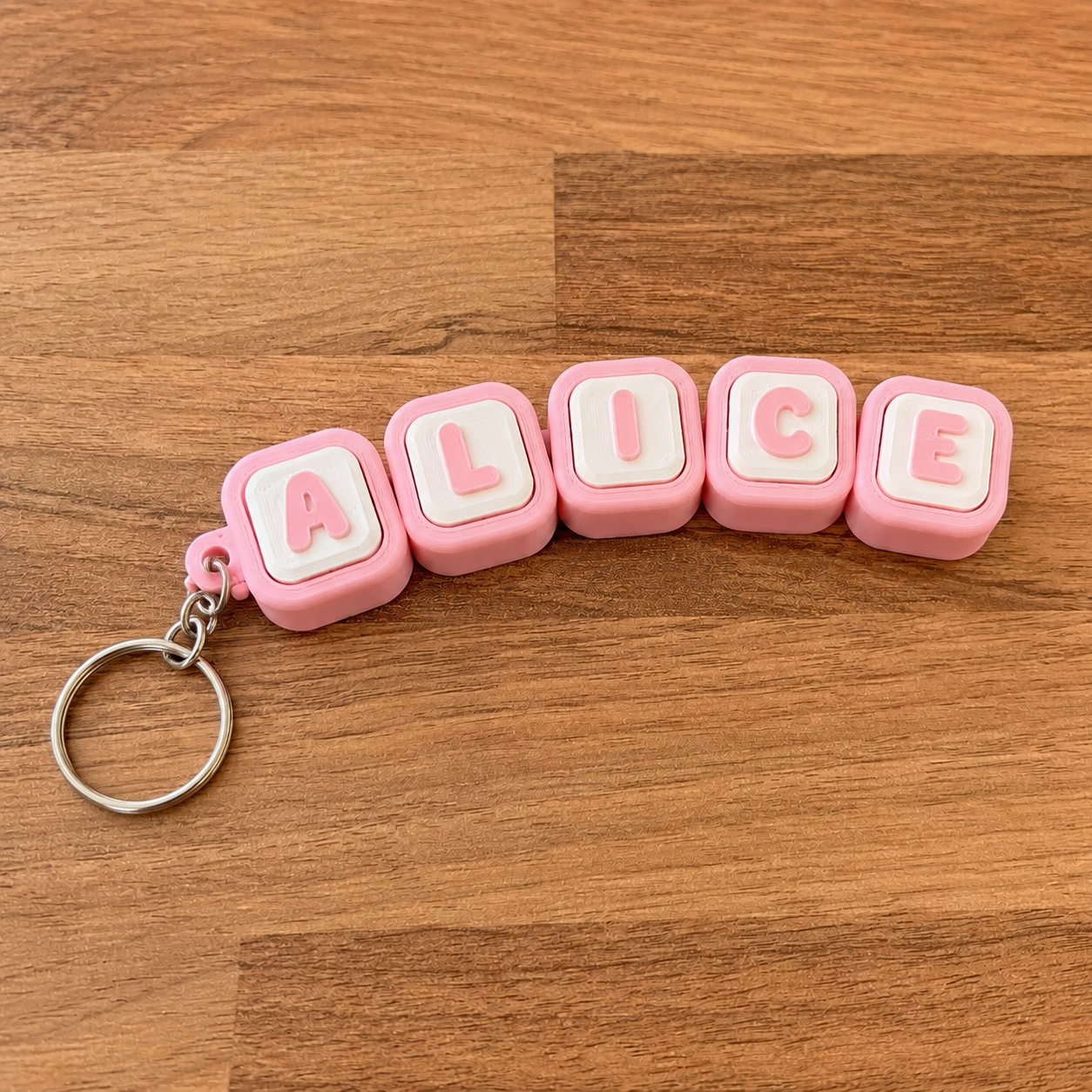 Personalized name tag clicker keyring 'Alice' — pink steel keyring, 3D printed