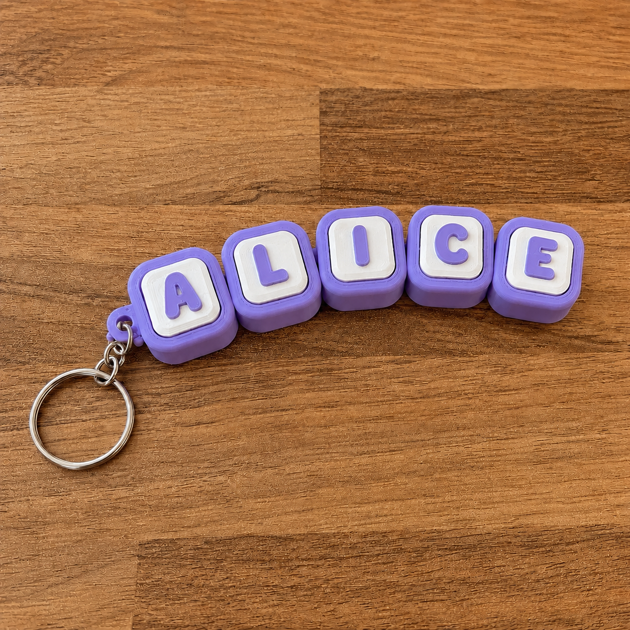 Personalized name tag clicker keyring 'Alice' — purple steel keyring, 3D printed
