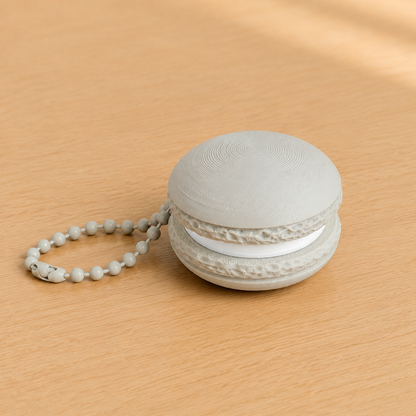 Bone White 3D printed macaron fidget clicker keychain with white filling and matching ball chain