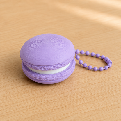 Lilac Purple 3D printed macaron fidget clicker keychain with white filling and matching ball chain