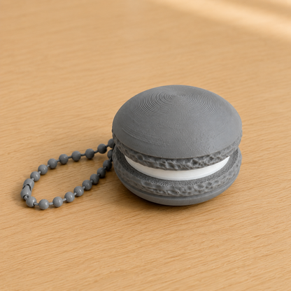 Nardo Gray 3D printed macaron fidget clicker keychain with white filling and matching ball chain