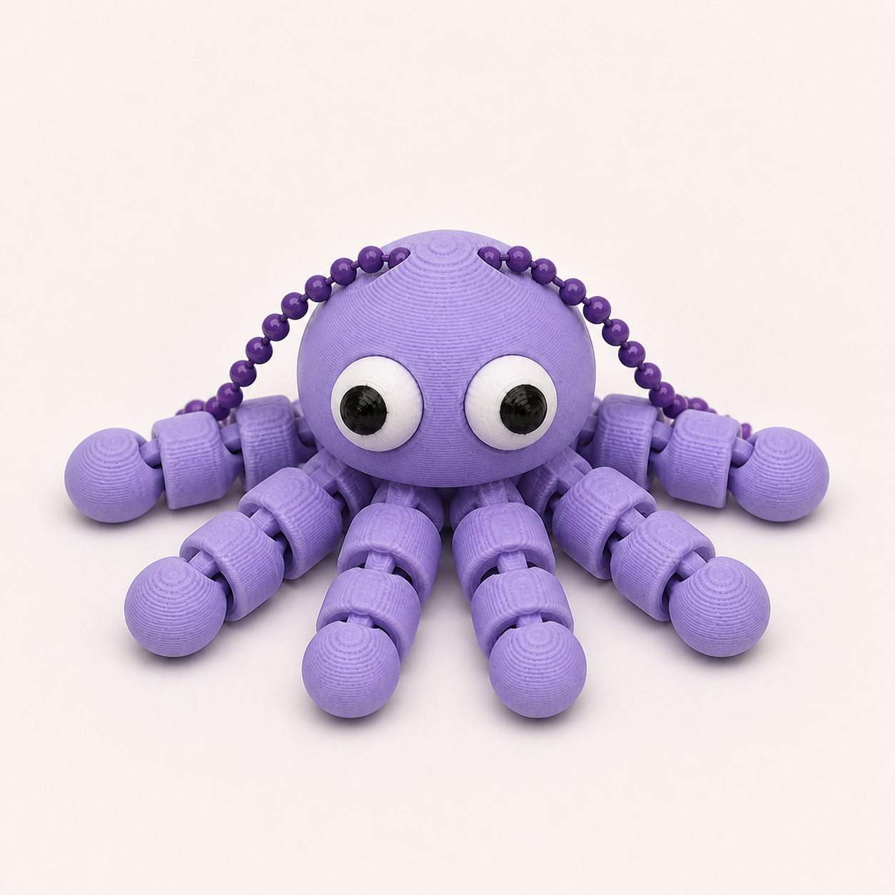 Lilac Purple articulated octopus flexi keychain with white eyes, on a ball chain