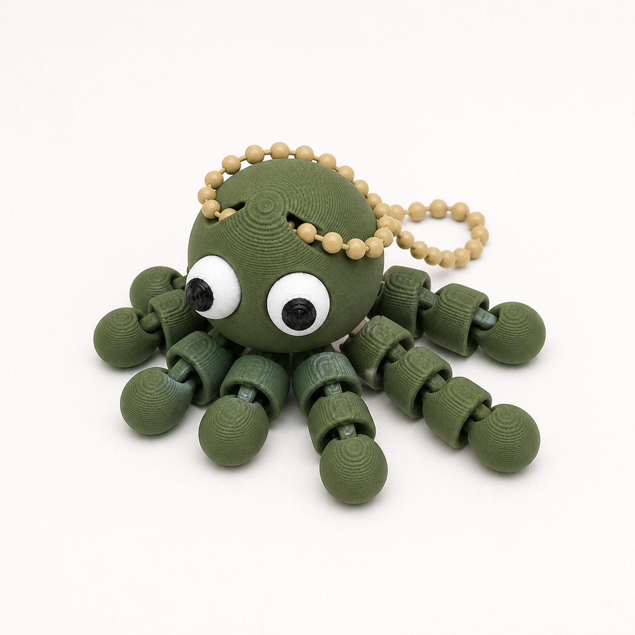 Dark Green articulated octopus flexi keychain with white eyes, on a ball chain