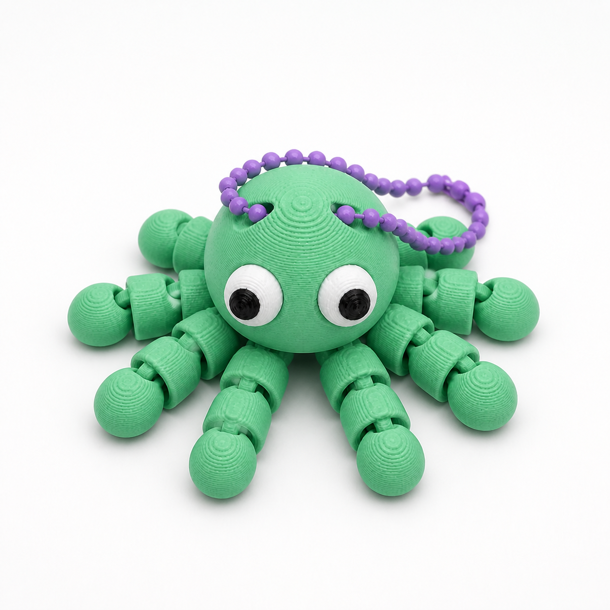 Grass Green articulated octopus flexi keychain with white eyes, on a ball chain