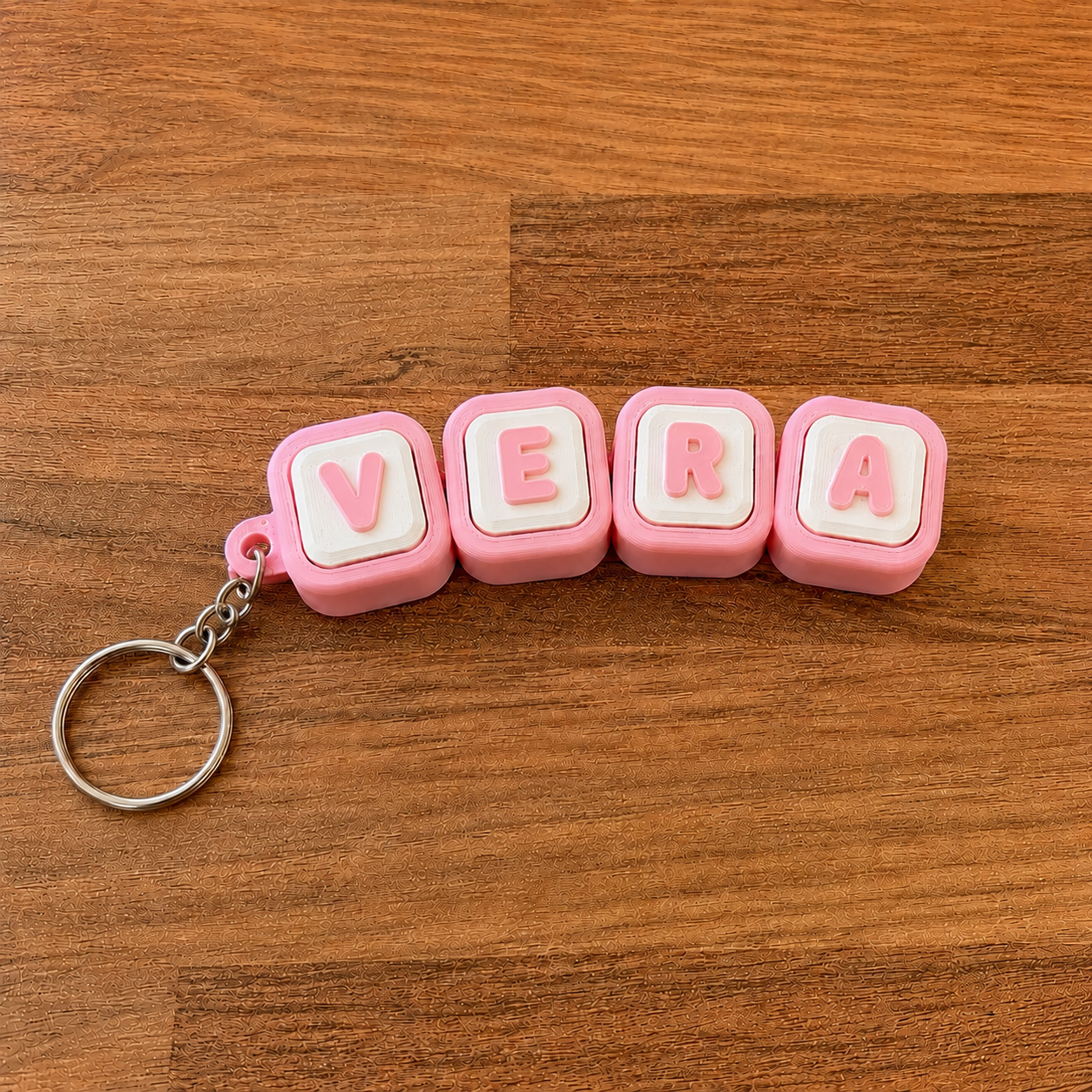 Personalized name tag clicker keyring 'Vera' — pink steel keyring, 3D printed